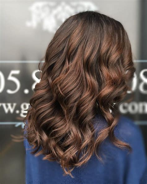 Blonde accents on light brown hair give it a delicate and feminine look. . Highlights and lowlights for dark brown hair